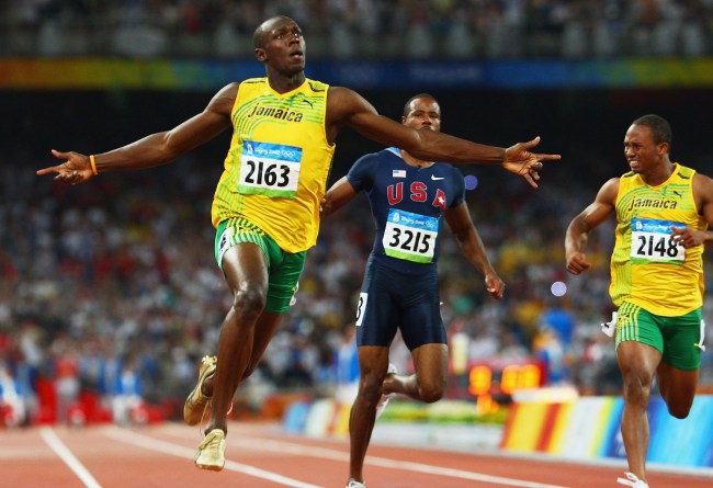 Usain Bolt celebrates winning 100m sprint at 2008 Summer Olympics
